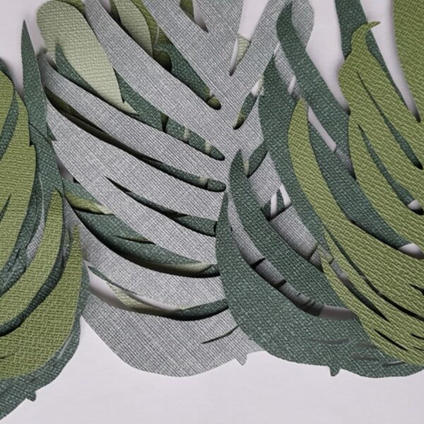 Behangdecoratie babykamer behang tropisch blad groentinten junglekamer